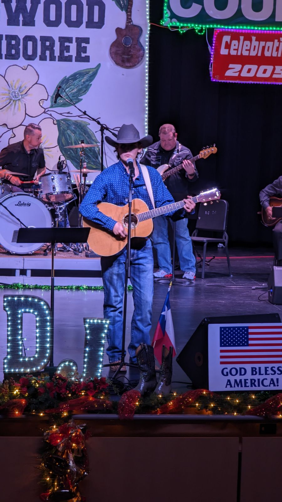 Photograph of Elias Lightsey playing on stage at the Dogwood Jamboree